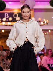 Fashion show photo of Czucz Studio organic cotton hooded rime sweater