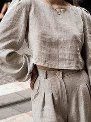 Close up fashion photo of natural coloured linen shirt and pants